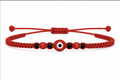 Pulsera Tejida Roja con Ojo Turco Ajustable – Amuleto de Protección y Buena Fortuna